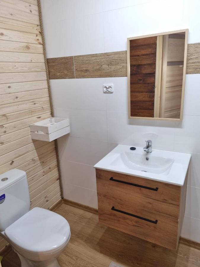 Domki Pod Debami Поберово Экстерьер фото