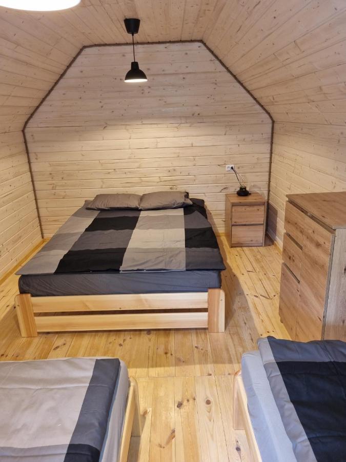 Domki Pod Debami Поберово Экстерьер фото