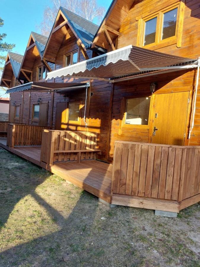 Domki Pod Debami Поберово Экстерьер фото